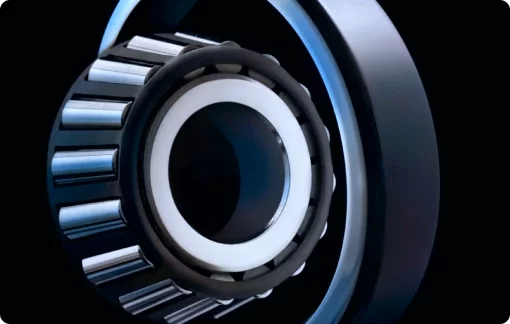 A spherical roller bearing on a black background.
